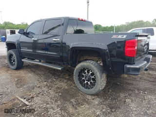 2015 Chevrolet Silverado 1500 LT with VIN 3GCUKREC9FG142970, listed as a IAAI auction lot 42064960 with 77,479 mi miles. Bid and sale history available at carsss.com. Image 3.