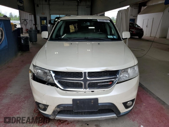 2013 Dodge Journey SXT with VIN 3C4PDDBG1DT521452, listed as a Copart auction lot 62660785 with 177,945 mi miles and Salvage title. Bid and sale history available at DreamBid. Image 5.