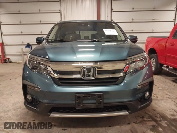 2019 Honda Pilot EX-L with VIN 5FNYF6H5XKB094879, listed as a IAAI auction lot 41265415 with 58,700 mi miles and . Bid and sale history available at DreamBid. Image 13.