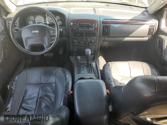 2002 Jeep Grand Cherokee Limited with VIN 1J8GW58NX2C158544, listed as a Copart auction lot 54937665 with 259,089 mi miles and Salvage title. Bid and sale history available at DreamBid. Image 8.