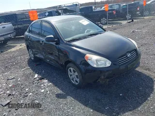 2010 Hyundai Accent GLS with VIN KMHCN4AC9AU450198, listed as a IAAI auction lot 41881169 with 185,324 mi miles. Bid and sale history available at carsss.com. Image 1.