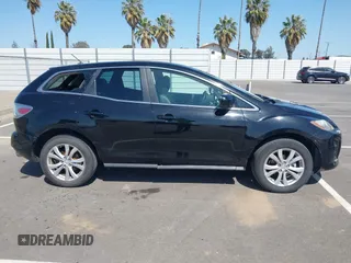 2011 Mazda CX-7 s Touring with VIN JM3ER4C32B0356372, listed as a IAAI auction lot 42003608 with 127,071 mi miles. Bid and sale history available at carsss.com. Image 13.