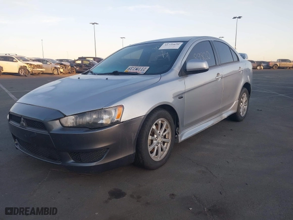 2012 Mitsubishi Lancer ES with VIN JA32U2FU1CU027013, listed as a IAAI auction lot 41739820 with 124,549 mi miles. Bid and sale history available at carsss.com. Image 2.