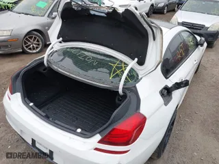 2014 BMW 6 Series 650i with VIN WBA6B2C55ED129596, listed as a IAAI auction lot 41927727 with 999,999 mi miles. Bid and sale history available at carsss.com. Image 6.