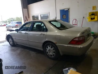 2004 Acura RL w/Navigation System z VIN JH4KA96644C004769, wystawiony jako Copart lot #59800205 z przebiegiem 172 279 mil mil oraz Szkoda całkowita • Salvage title. Historia ofert i sprzedaży dostępna na DreamBid. Obrazek 2.