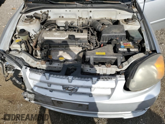 2005 Hyundai Accent GLS with VIN KMHCG45C05U618580, listed as a Copart auction lot 79239064 with 54,228 mi miles and Salvage Title. Bid and sale history available at carsss.com. Image 11.