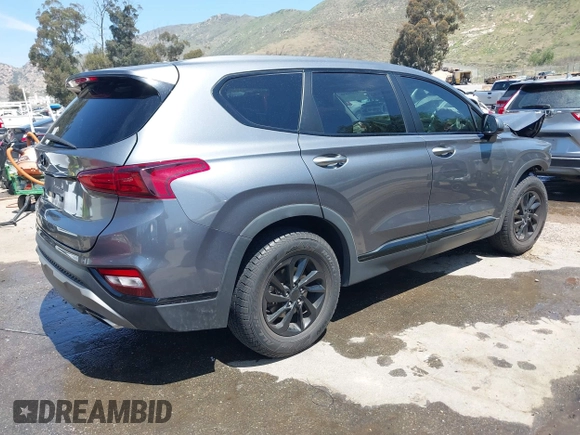 2019 Hyundai Santa Fe SE with VIN 5NMS23AD7KH009688, listed as a IAAI auction lot 41991686 with 77,942 mi miles and . Bid and sale history available at DreamBid. Image 4.
