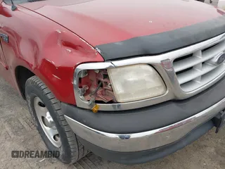 1999 Ford F-150 z VIN 1FTZF1729XNB02459, wystawiony jako IAAI lot #41720795 z przebiegiem 202 661 mil mil oraz . Historia ofert i sprzedaży dostępna na DreamBid. Obrazek 12.