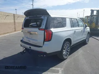 2022 GMC Yukon XL Denali with VIN 1GKS2JKL1NR217354, listed as a IAAI auction lot 41406548 with 29,940 mi miles and . Bid and sale history available at carsss.com. Image 4.