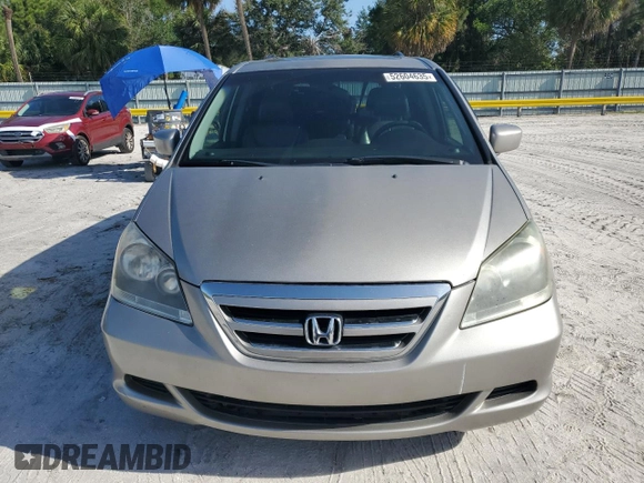 2007 Honda Odyssey EX-L with VIN 5FNRL387X7B043046, listed as a Copart auction lot 52604635 with 228,961 mi miles and Salvage Title. Bid and sale history available at carsss.com. Image 5.
