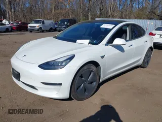 2020 Tesla Model 3 Standard Range Plus with VIN 5YJ3E1EA0LF783672, listed as a IAAI auction lot 41903431 with 52,157 mi miles and . Bid and sale history available at carsss.com. Image 20.
