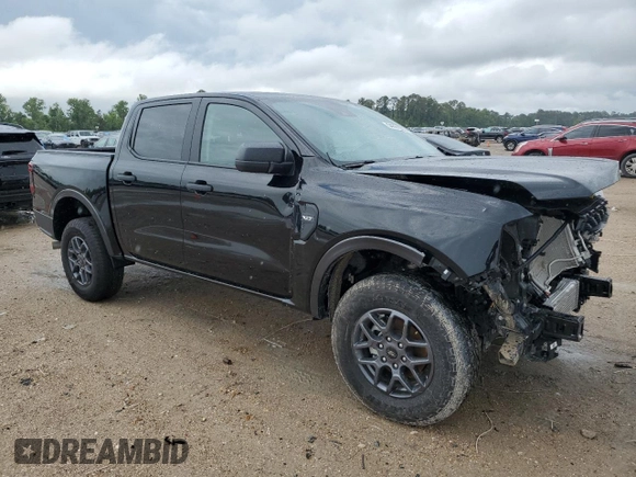 2024 Ford Ranger XLT with VIN 1FTER4GH8RLE27713, listed as a Copart auction lot 54061055 with 11,563 mi miles and Salvage Title. Bid and sale history available at carsss.com. Image 4.