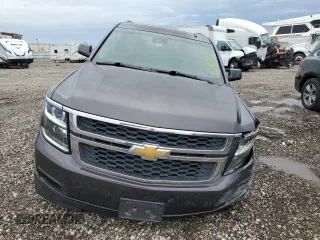 2015 Chevrolet Tahoe LT with VIN 1GNSCBKC3FR282603, listed as a Copart auction lot 50191155 with 219,272 mi miles and Salvage Title. Bid and sale history available at DreamBid. Image 5.