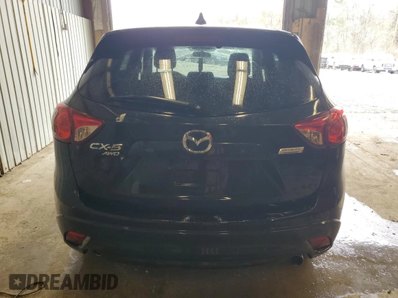 2013 Mazda CX-5 Touring with VIN JM3KE4CE6D0113909, listed as a Copart auction lot 53973355 with 117,335 mi miles and Salvage Title. Bid and sale history available at DreamBid. Image 6.