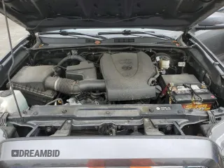 2017 Toyota Tacoma SR5 z VIN 3TMAZ5CNXHM048452, wystawiony jako Copart lot #52996785 z przebiegiem 71 588 mil mil oraz Szkoda całkowita • Salvage title. Historia ofert i sprzedaży dostępna na DreamBid. Obrazek 11.