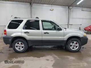 2005 Ford Escape XLT with VIN 1FMYU03115KA29039, listed as a IAAI auction lot 42159988 with 240,047 mi miles and . Bid and sale history available at DreamBid. Image 13.