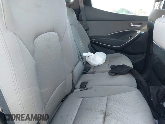 2018 Hyundai Santa Fe 2.4L z VIN 5NMZUDLB7JH077241, wystawiony jako IAAI lot #42135854 z przebiegiem 59 819 mil mil oraz . Historia ofert i sprzedaży dostępna na DreamBid. Obrazek 8.