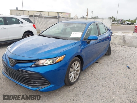 2020 Toyota Camry LE with VIN 4T1L11AK5LU310671, listed as a IAAI auction lot 41732306 with 61,379 mi miles and . Bid and sale history available at carsss.com. Image 18.