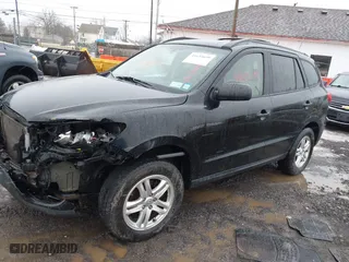 2012 Hyundai Santa Fe GLS with VIN 5XYZG3ABXCG159336, listed as a IAAI auction lot 41635699 with 128,975 mi miles. Bid and sale history available at carsss.com. Image 2.