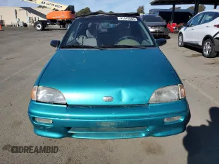 1993 Geo Metro z VIN JG1MR3367PK201491, wystawiony jako Copart lot #41543565 z przebiegiem 61 829 mil mil oraz Tytuł czysty. Historia ofert i sprzedaży dostępna na DreamBid. Obrazek 5.