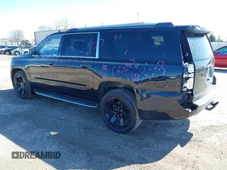 2017 Chevrolet Suburban Premier with VIN 1GNSKJKC8HR285321, listed as a IAAI auction lot 41796659 with 128,113 mi miles and . Bid and sale history available at DreamBid. Image 3.