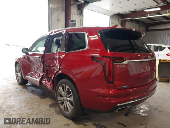 2020 Cadillac XT6 AWD Premium Luxury with VIN 1GYKPDRS0LZ215534, listed as a IAAI auction lot 42299906 with 23,004 mi miles and . Bid and sale history available at DreamBid. Image 3.