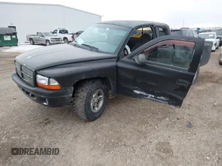1999 Dodge Dakota SLT with VIN 1B7GG22Y6XS231301, listed as a IAAI auction lot 41427598 with Not Provided miles and . Bid and sale history available at carsss.com. Image 17.