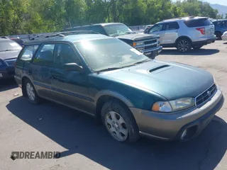 1998 Subaru Legacy Outback with VIN 4S3BG685XW6615751, listed as a IAAI auction lot 42665501 with 216,878 mi miles and . Bid and sale history available at DreamBid. Image 1.