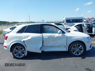 2016 Audi Q3 Premium Plus z VIN WA1BFCFS0GR014028, wystawiony jako IAAI lot #42274987 z przebiegiem 64 667 mil mil oraz . Historia ofert i sprzedaży dostępna na DreamBid. Obrazek 13.