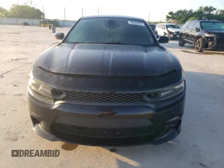 2015 Dodge Charger SXT z VIN 2C3CDXHG0FH866849, wystawiony jako Copart lot #52026055 z przebiegiem 111 043 mil mil oraz Szkoda całkowita • Salvage title. Historia ofert i sprzedaży dostępna na DreamBid. Obrazek 5.