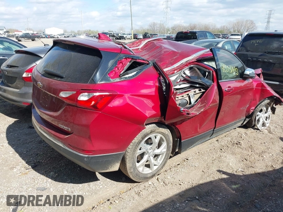 2021 Chevrolet Equinox Premier z VIN 2GNAXNEV7M6140889, wystawiony jako IAAI lot #42039443 z przebiegiem 101 767 mil mil oraz . Historia ofert i sprzedaży dostępna na DreamBid. Obrazek 4.