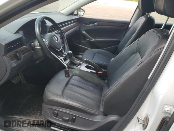 2020 Volkswagen Passat with VIN 1VWEA7A32LC004720, listed as a Copart auction lot 57310295 with 125,589 mi miles and Salvage title. Bid and sale history available at DreamBid. Image 7.