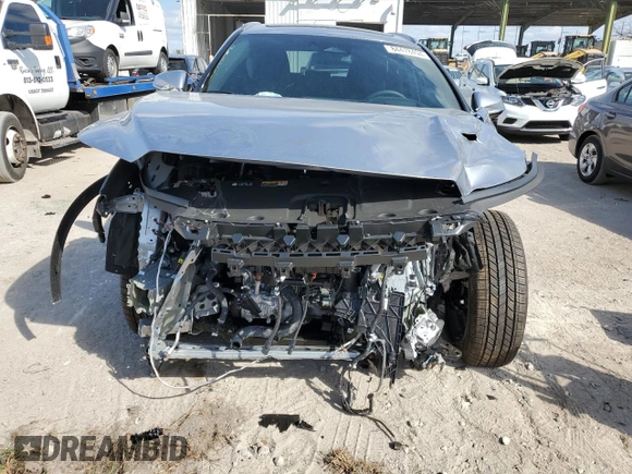 2024 Lexus RX with VIN 2T2BAMBA7RC047799, listed as a Copart auction lot 84478494 with 1,943 mi miles and Salvage Title. Bid and sale history available at carsss.com. Image 5.