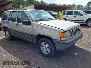 1994 Jeep Grand Cherokee Laredo with VIN 1J4GZ58Y0RC200247, listed as a IAAI auction lot 41781078 with 217,698 mi miles. Bid and sale history available at carsss.com. Image 1.