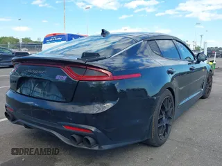 2018 Kia Stinger Premium z VIN KNAE25LAXJ6014856, wystawiony jako IAAI lot #42242842 z przebiegiem 86 091 mil mil oraz . Historia ofert i sprzedaży dostępna na DreamBid. Obrazek 4.