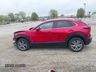 2023 Mazda CX-30 S Premium with VIN 3MVDMBDM3PM511402, listed as a IAAI auction lot 42180001 with 6,189 mi miles and . Bid and sale history available at DreamBid. Image 15.