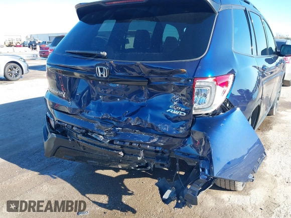 2023 Honda Passport Elite with VIN 5FNYF8H06PB012234, listed as a IAAI auction lot 41208146 with 38,491 mi miles and . Bid and sale history available at DreamBid. Image 6.