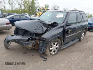 2007 GMC Envoy SLE z VIN 1GKDS13S572214421, wystawiony jako IAAI lot #42186747 z przebiegiem Nie podano mil oraz . Historia ofert i sprzedaży dostępna na DreamBid. Obrazek 2.