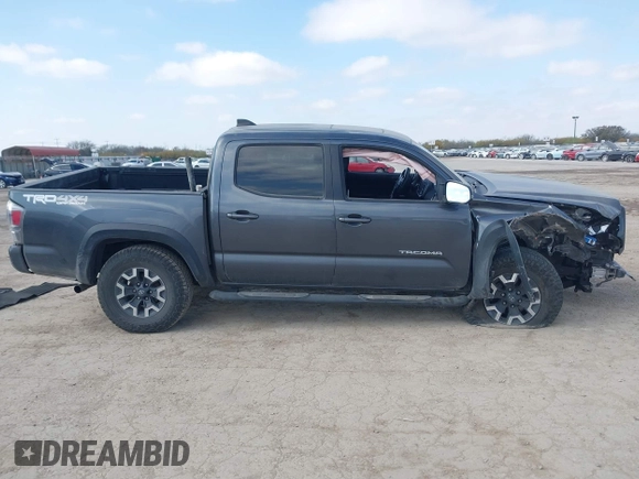 2021 Toyota Tacoma 4WD SR with VIN 3TMCZ5AN4MM387519, listed as a IAAI auction lot 41769922 with 61,813 mi miles. Bid and sale history available at carsss.com. Image 14.