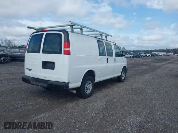 2013 Chevrolet Express Cargo with VIN 1GCWGFBA7D1110560, listed as a IAAI auction lot 41730234 with 185,291 mi miles and . Bid and sale history available at DreamBid. Image 4.