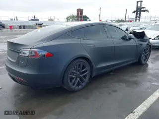 2021 Tesla Model S Plaid with VIN 5YJSA1E63MF433991, listed as a IAAI auction lot 41499209 with 44,412 mi miles. Bid and sale history available at carsss.com. Image 4.