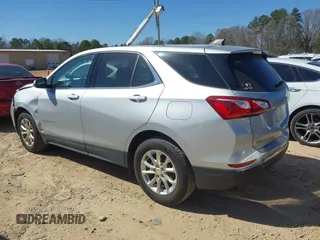 2019 Chevrolet Equinox LT with VIN 2GNAXUEV0K6285473, listed as a IAAI auction lot 41772103 with 59,268 mi miles and . Bid and sale history available at carsss.com. Image 3.