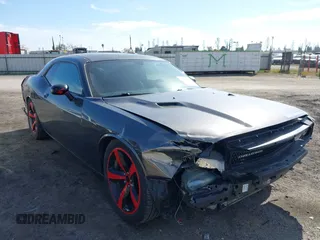 2014 Dodge Challenger R/T z VIN 2C3CDYBT1EH216793, wystawiony jako IAAI lot #41603015 z przebiegiem 73 694 mil mil oraz . Historia ofert i sprzedaży dostępna na DreamBid. Obrazek 1.