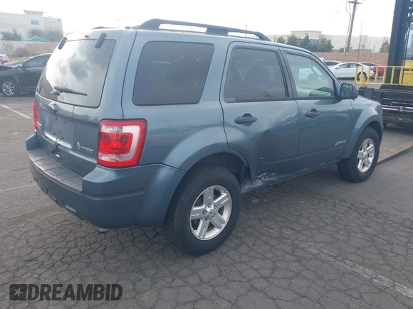 2012 Ford Escape Hybrid z VIN 1FMCU5K36CKB12795, wystawiony jako IAAI lot #41870941 z przebiegiem 91 570 mil mil oraz . Historia ofert i sprzedaży dostępna na DreamBid. Obrazek 4.