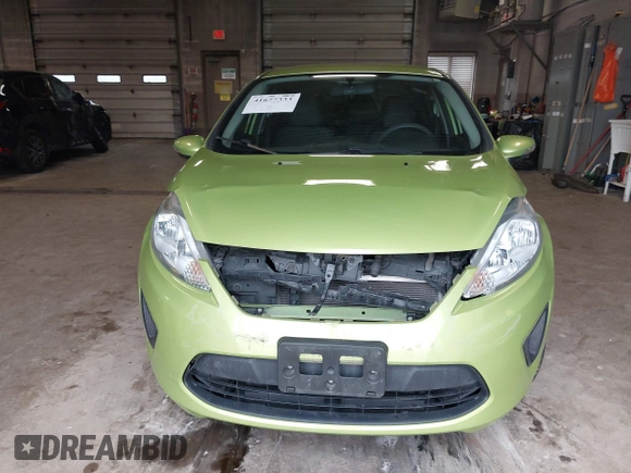 2013 Ford Fiesta SE with VIN 3FADP4EJ9DM131913, listed as a IAAI auction lot 41677333 with 54,673 mi miles. Bid and sale history available at carsss.com. Image 12.