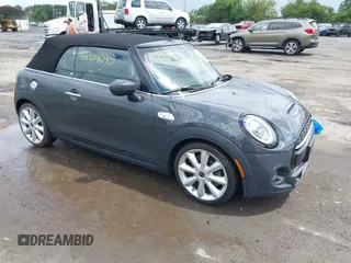 2021 MINI Convertible Cooper S z VIN WMWWJ5C06M3M15700, wystawiony jako IAAI lot #42314045 z przebiegiem 41 080 mil mil oraz . Historia ofert i sprzedaży dostępna na DreamBid. Obrazek 1.
