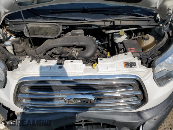 2016 Ford Transit Cargo with VIN 1FTYR1ZM5GKB42881, listed as a Copart auction lot 70193724 with 140,928 mi miles and Salvage Title. Bid and sale history available at DreamBid. Image 12.