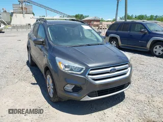 2017 Ford Escape SE z VIN 1FMCU9G9XHUD90910, wystawiony jako IAAI lot #42333320 z przebiegiem 103 073 mil mil oraz . Historia ofert i sprzedaży dostępna na DreamBid. Obrazek 1.
