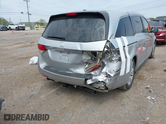 2014 Honda Odyssey EX-L with VIN 5FNRL5H60EB115792, listed as a IAAI auction lot 42064607 with 191,055 mi miles and . Bid and sale history available at carsss.com. Image 4.
