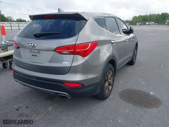 2015 Hyundai Santa Fe Sport with VIN 5XYZTDLB0FG280038, listed as a IAAI auction lot 41968353 with 166,785 mi miles. Bid and sale history available at carsss.com. Image 4.